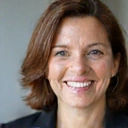 Client Emily R. looking happy